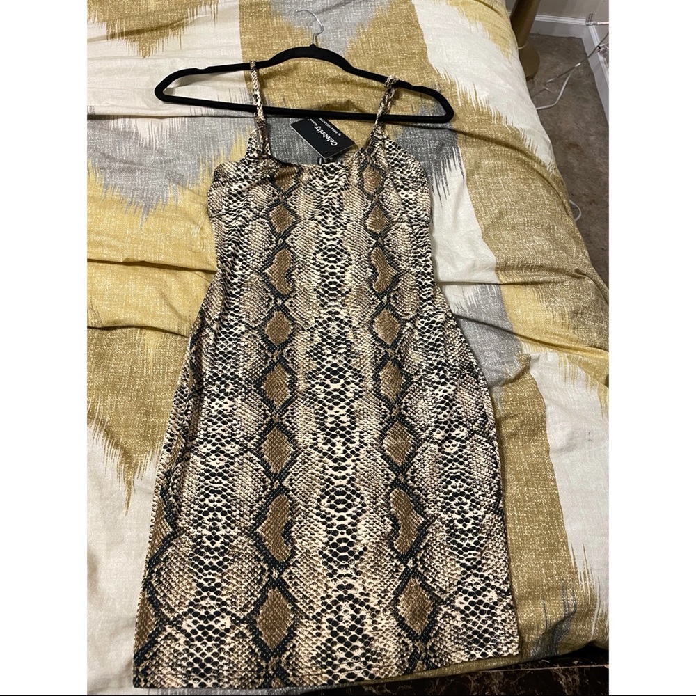 Leopard mini dress, brand new. Never worn.